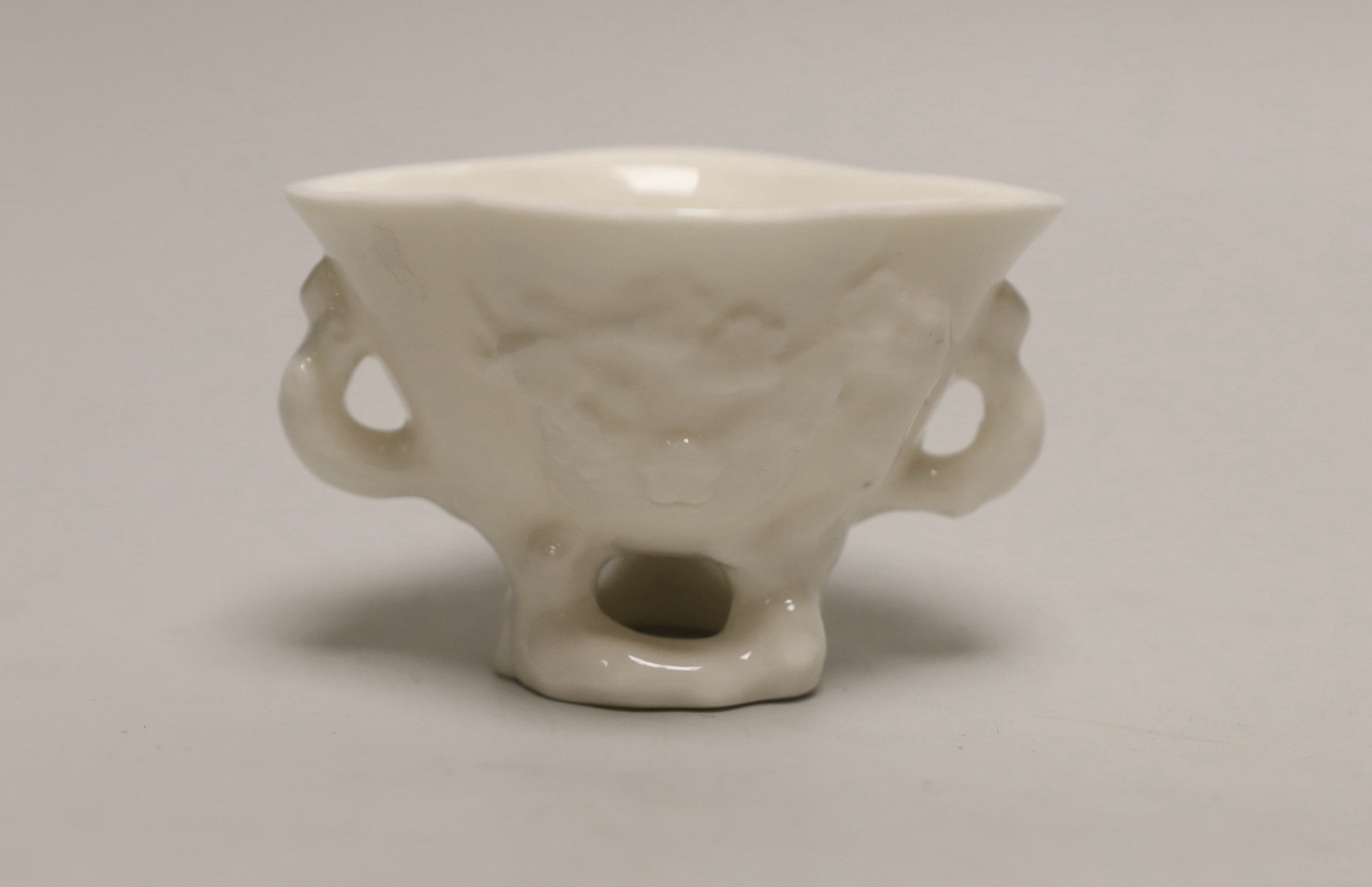Three Chinese soapstone seals, a pottery bird and a blanc de chine pot
